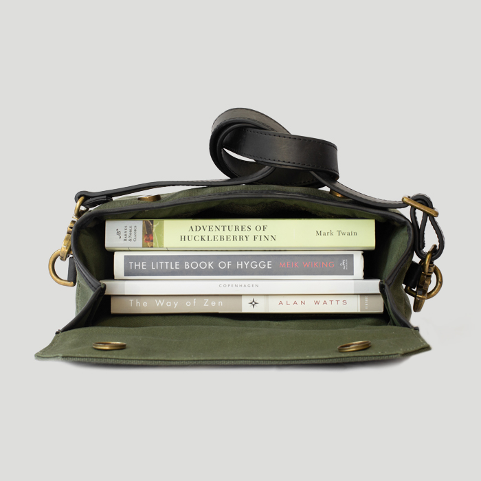 differently sized books fit perfectly in the Ally messenger bag, perfect for students
